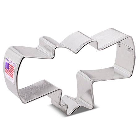 A diploma cookie cutter by ann clark. the size is 4 1/4"