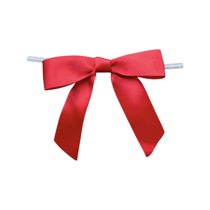 a red pretied bow on a wire 