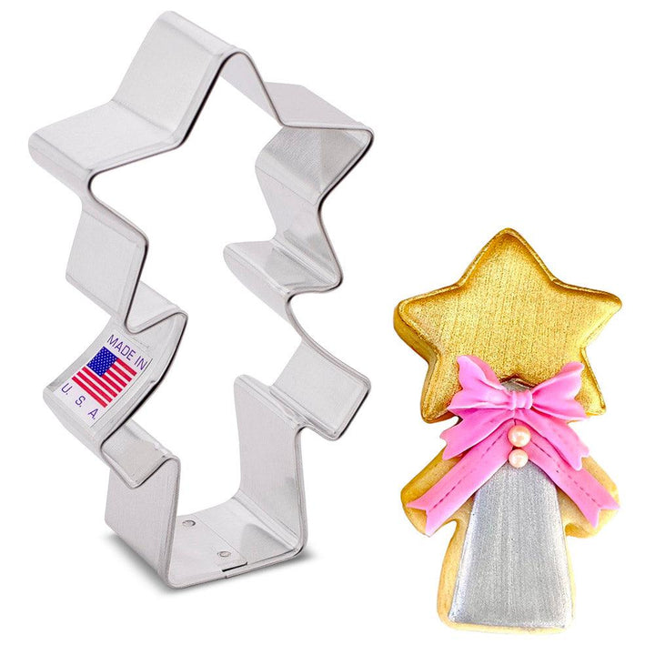 a magic wand cookie cutter by ann clark cookie cutters with a decorated cookie 